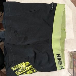 Black and Yellow Nike Pro shorts